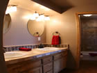 double sink bathroom vanity with tumbled marble.