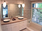 mountain bathroom with tree view.