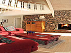 golf course condo living room with fireplace.