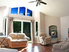 custom living room with hard wood floors.
